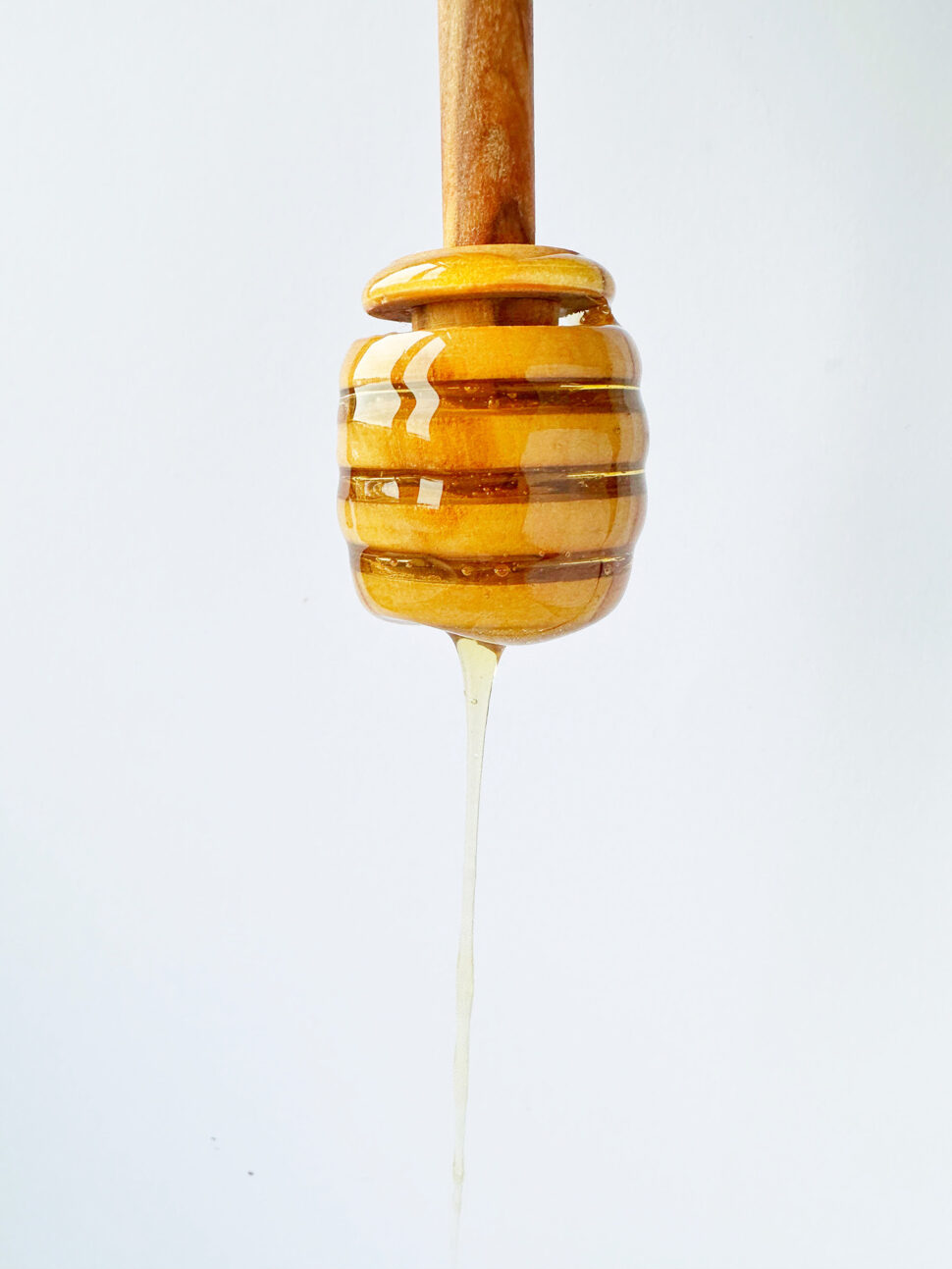 Flydende honning dansk samlet fra bistader omkring Mejnerts økologiske marker